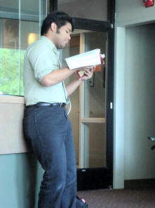 Image: Paul Susi looks over his lines for the next scene.